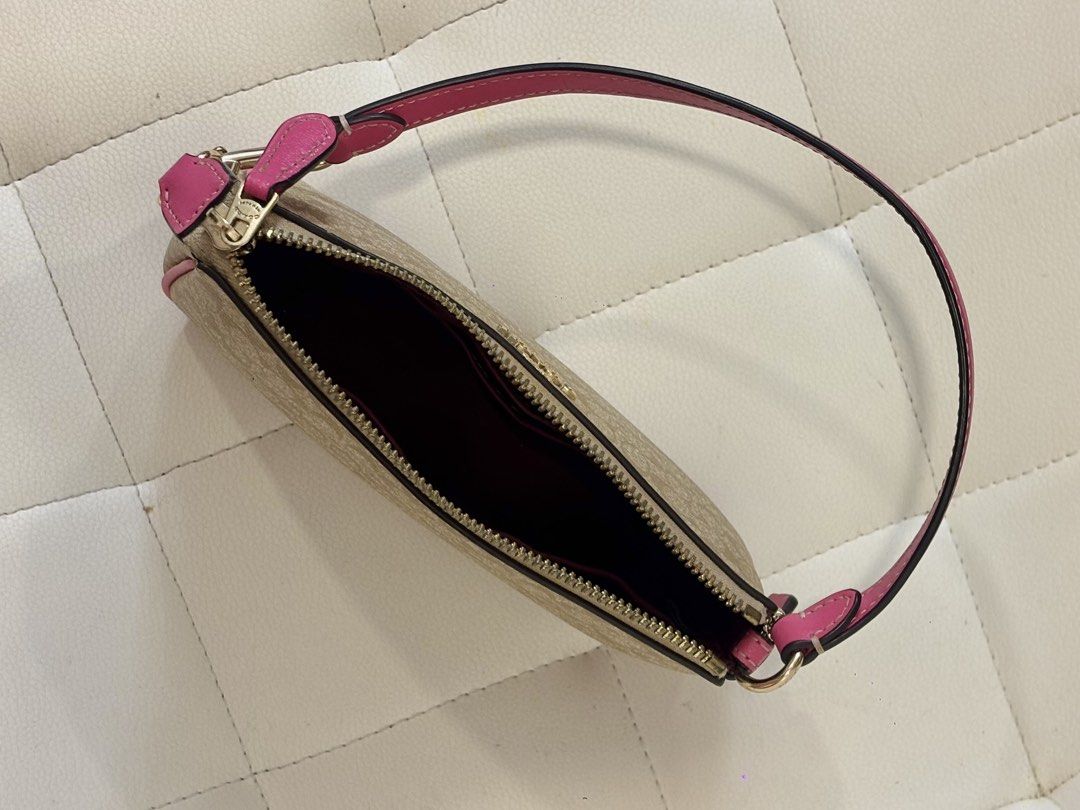Coach Nolita 19 (Category: Luxury Bags & Wallets) located in Andop. Submitted by pinkmatcha0715 (Listing ID 1438644780, Image 3). Description: - Negotiable for sure buyers - Authentic Coach Nolita 19 - Rare Color - Pink trim and wrist strap - Gold-tone zipper and hardware - Includes pink Coach tag Loc: Davao City.