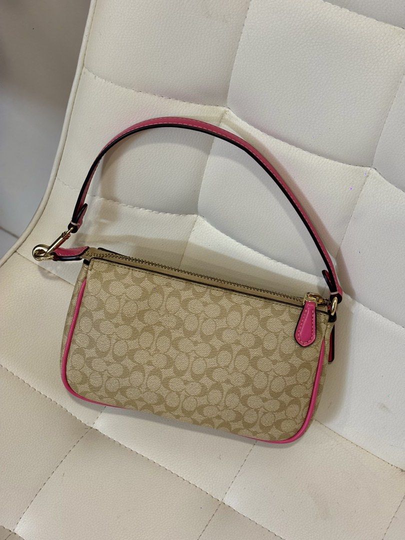 Coach Nolita 19 (Category: Luxury Bags & Wallets) located in Andop. Submitted by pinkmatcha0715 (Listing ID 1438644780, Image 2). Description: - Negotiable for sure buyers - Authentic Coach Nolita 19 - Rare Color - Pink trim and wrist strap - Gold-tone zipper and hardware - Includes pink Coach tag Loc: Davao City.