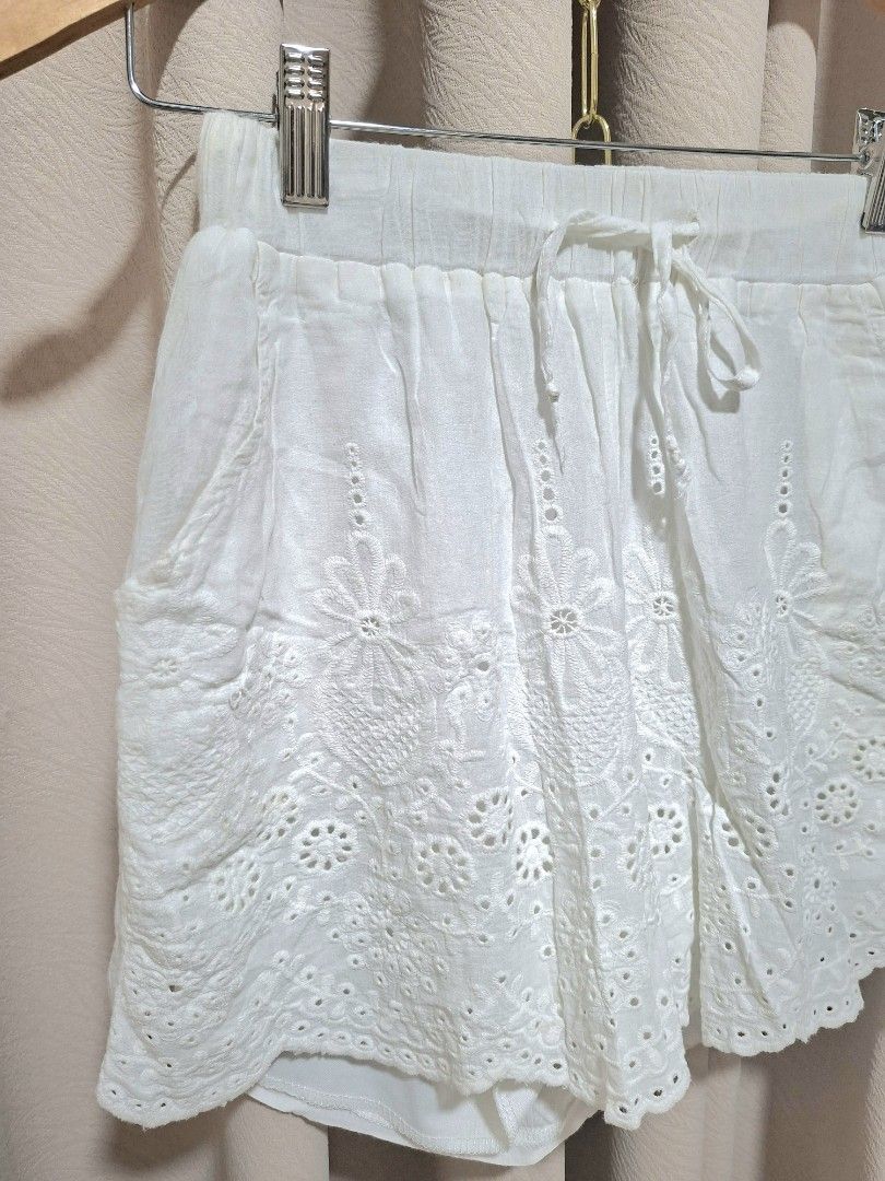 Coco Cabana White Embroidered Shorts - Size M (Category: Shorts) located in Batangas. Submitted by sell_ph (Listing ID 1438616920, Image 2). Description: - Coco Cabana white shorts - Size: M - Features: Embroidered details, drawstring waist, two pockets - Fabric: Lightweight, ideal for warm weather - Versatile style: Can be dressed up or down - Waist 24-32 - Length 14.