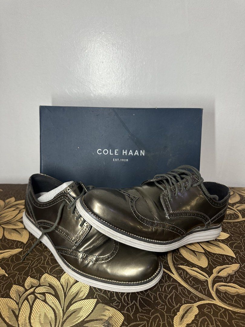 Cole Haan Wingtip Oxford Shoes (Category: Dress Shoes) located in Batangas. Submitted by jim2621 (Listing ID 1438541077, Image 1). Description: - Cole Haan wingtip oxford shoes - Metallic finish - White soles - Lace-up closure - Classic wingtip design - Includes original box - Good overall condition - Worn 3 times.