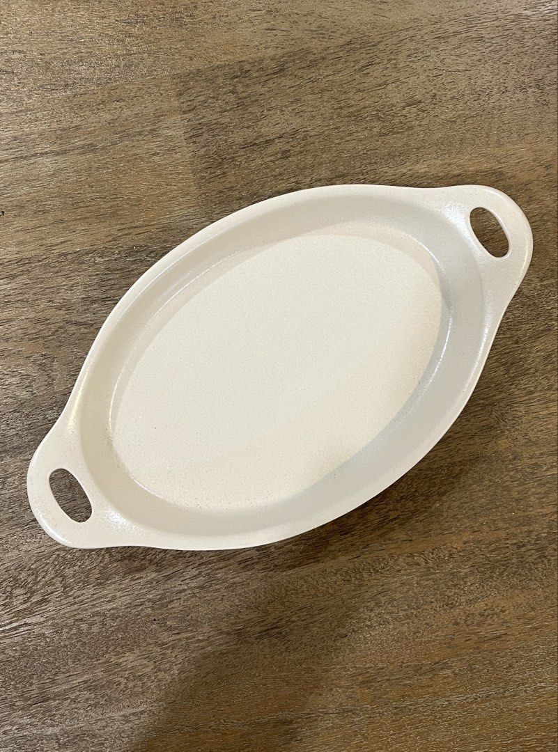 CorningWare Creations Stoneware (Category: Dinnerware & Cutlery) located in Pasig City. Submitted by tylernchloe (Listing ID 1438564599, Image 1). Description: - Stoneware baking or serving dish - Creamy white color - With handles on each end - Slightly textured surface - Great for appetizers, side dishes, desserts, and baked pasta. - Made in Thailand - Note use restrictions on label - list price final.