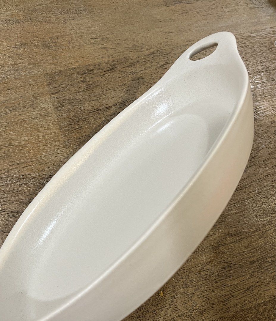 CorningWare Creations Stoneware (Category: Dinnerware & Cutlery) located in Pasig City. Submitted by tylernchloe (Listing ID 1438564599, Image 2). Description: - Stoneware baking or serving dish - Creamy white color - With handles on each end - Slightly textured surface - Great for appetizers, side dishes, desserts, and baked pasta. - Made in Thailand - Note use restrictions on label - list price final.