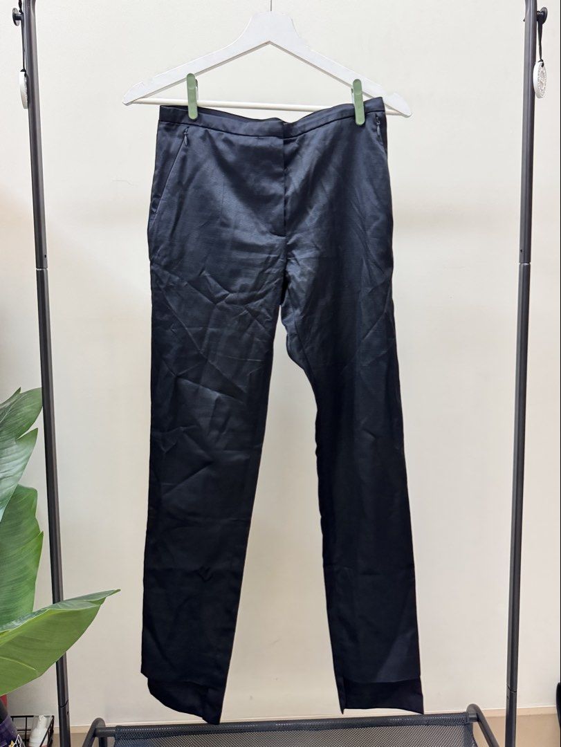 COS Black Satin Trousers (Category: Other Bottoms) located in Paranaque City. Submitted by panmakes (Listing ID 1438635386, Image 1). Description: - COS black trousers - Size: EUR 34 - Features: Satin finish, side pockets, zipper closure - Cut: Straight leg - Fit: Comfortable - Occasion: Casual or formal - Material: Polyester blend.