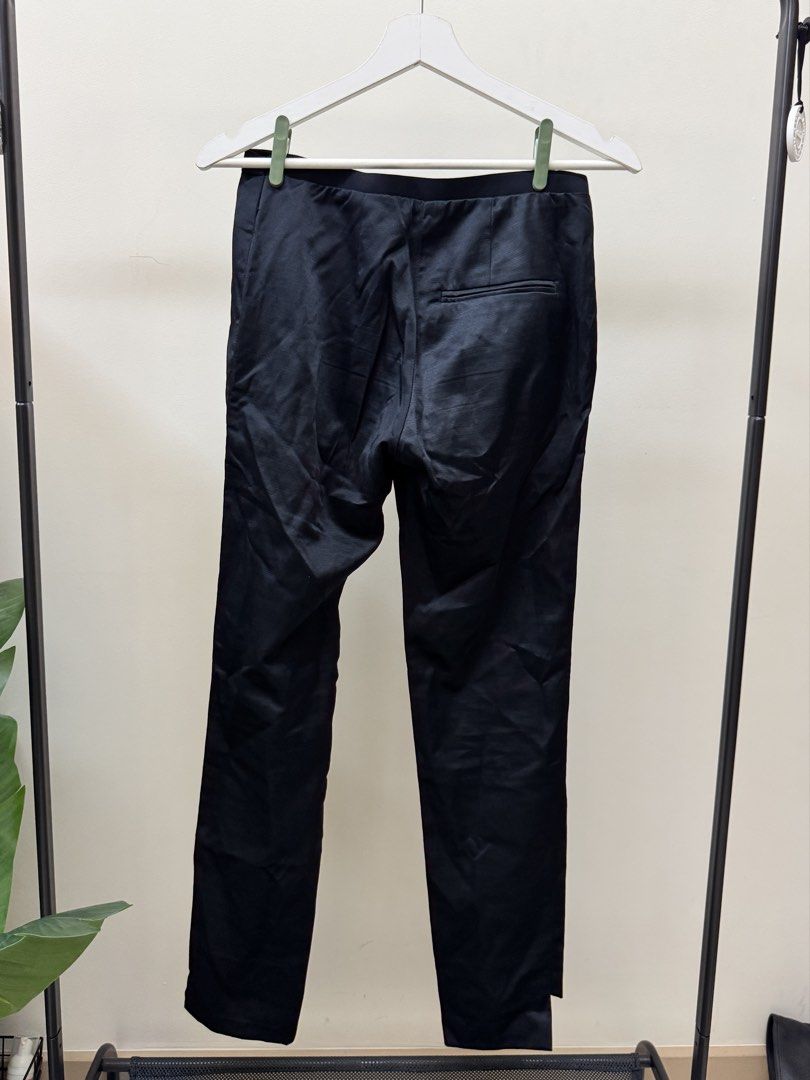 COS Black Satin Trousers (Category: Other Bottoms) located in Paranaque City. Submitted by panmakes (Listing ID 1438635386, Image 3). Description: - COS black trousers - Size: EUR 34 - Features: Satin finish, side pockets, zipper closure - Cut: Straight leg - Fit: Comfortable - Occasion: Casual or formal - Material: Polyester blend.