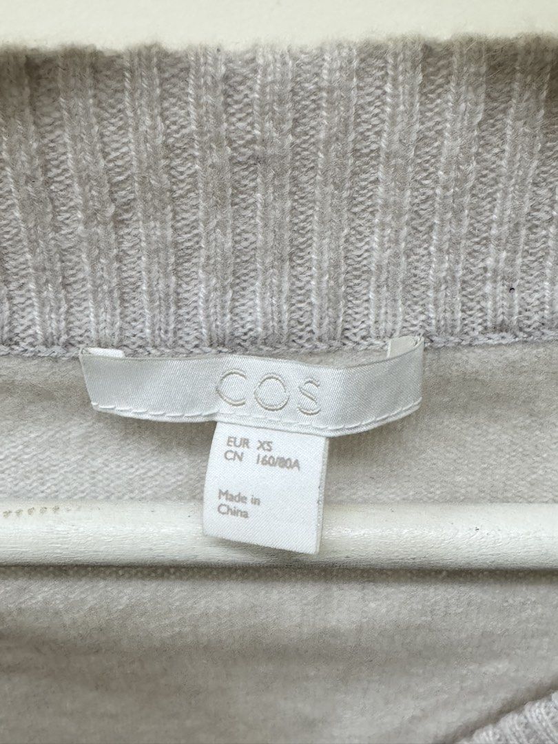 COS Cropped Cardigan - XS (Category: Coats, Jackets and Outerwear) located in Paranaque City. Submitted by panmakes (Listing ID 1438639979, Image 3). Description: - COS Cropped Cardigan - Size: XS - Style: V-neck, button closure - Sleeves: Long with ribbed cuffs - Hem: Ribbed - Color: Light neutral.