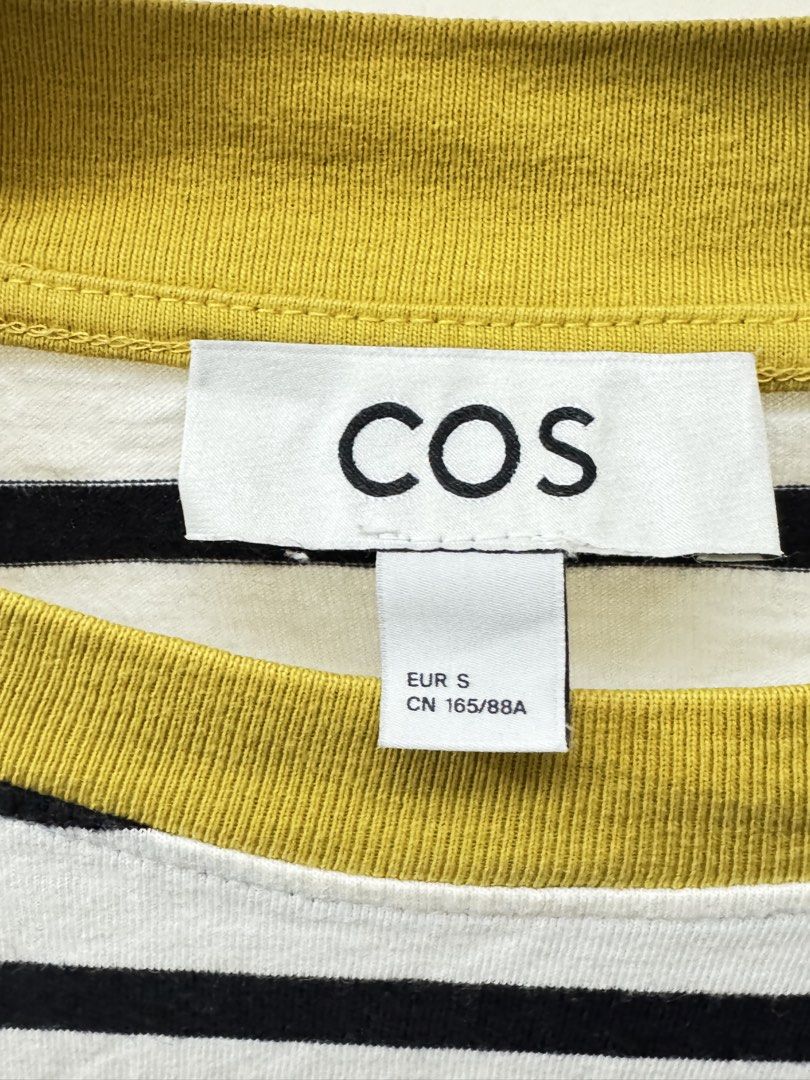COS Striped Long Sleeve Shirt (Category: Shirts) located in Paranaque City. Submitted by panmakes (Listing ID 1438635759, Image 3). Description: - COS long sleeve shirt - Black and white stripes - Features a yellow collar - Size S (EUR) - Made of comfortable material - Classic and versatile - Perfect for layering.