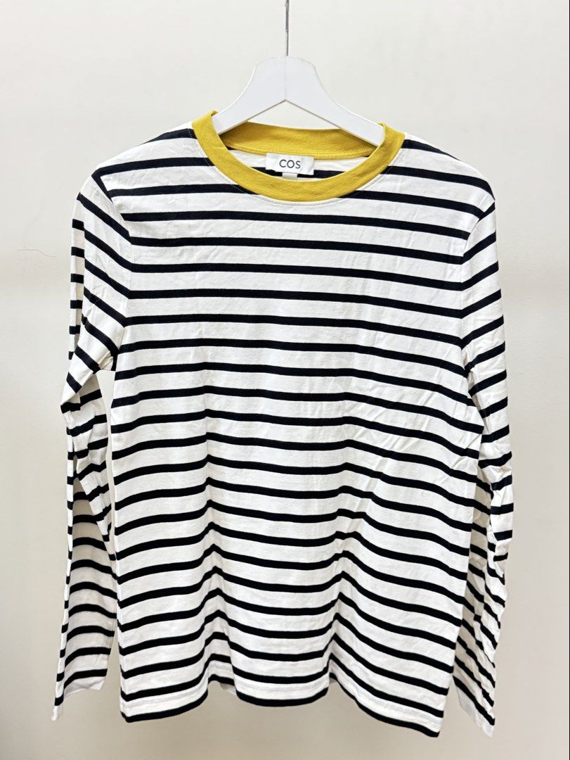 COS Striped Long Sleeve Shirt (Category: Shirts) located in Paranaque City. Submitted by panmakes (Listing ID 1438635759, Image 1). Description: - COS long sleeve shirt - Black and white stripes - Features a yellow collar - Size S (EUR) - Made of comfortable material - Classic and versatile - Perfect for layering.