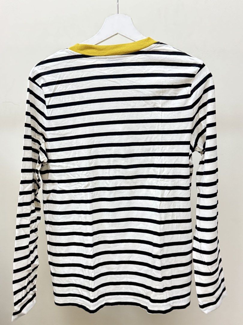 COS Striped Long Sleeve Shirt (Category: Shirts) located in Paranaque City. Submitted by panmakes (Listing ID 1438635759, Image 2). Description: - COS long sleeve shirt - Black and white stripes - Features a yellow collar - Size S (EUR) - Made of comfortable material - Classic and versatile - Perfect for layering.