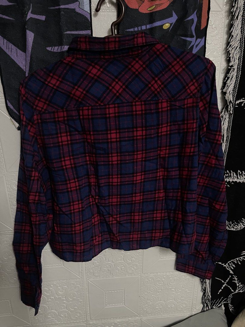 Divided Plaid Cropped Shirt - Size 12 (Category: Shirts) located in Quezon City. Submitted by listless32 (Listing ID 1438692546, Image 3). Description: W20 L is 18 Divided cropped plaid shirt. Red and blue plaid. Size 12. Long sleeves, collared, and button-down. Versatile style..