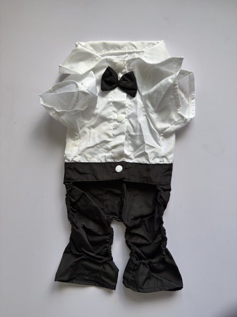 Dog Tuxedo Outfit (Category: Homes & Other Pet Accessories) located in Mandaluyong City. Submitted by shoppeachyflair (Listing ID 1438501605, Image 3). Description: Available in two sizes @ 50 each XL:Back Length: 34cm, Neck: 32cm, Bust: 44cm XXL: Back Length: 38cm, Neck: 34cm, Bust: 50cm Note: XXL has washable yellow stains due to storage- Dog tuxedo outfit for special occasions. — XL fits a small dog breed like pomeranian. XXL fits medium dog b