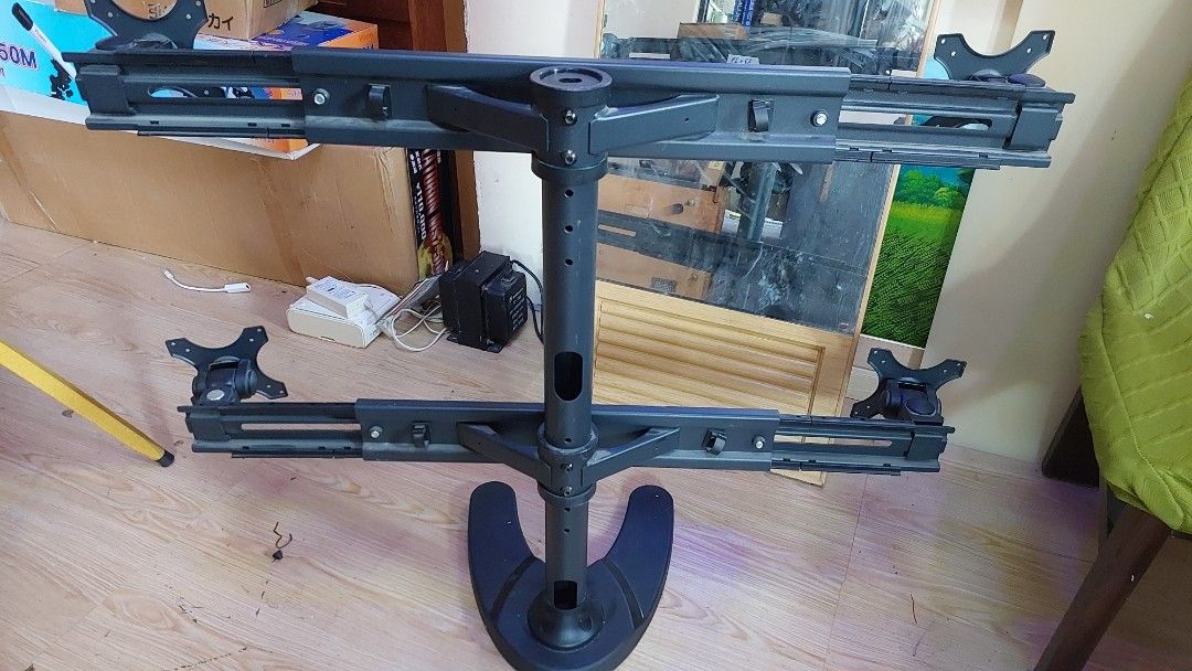 Monitor Stand (Category: Other Accessories) located in Baliuag. Submitted by papa.gardz (Listing ID 1438649674, Image 2). Description: - monitor stand - Black color - Sturdy base - Adjustable arms for height and angle - Ergonomic setup - Holds 4 monitors.