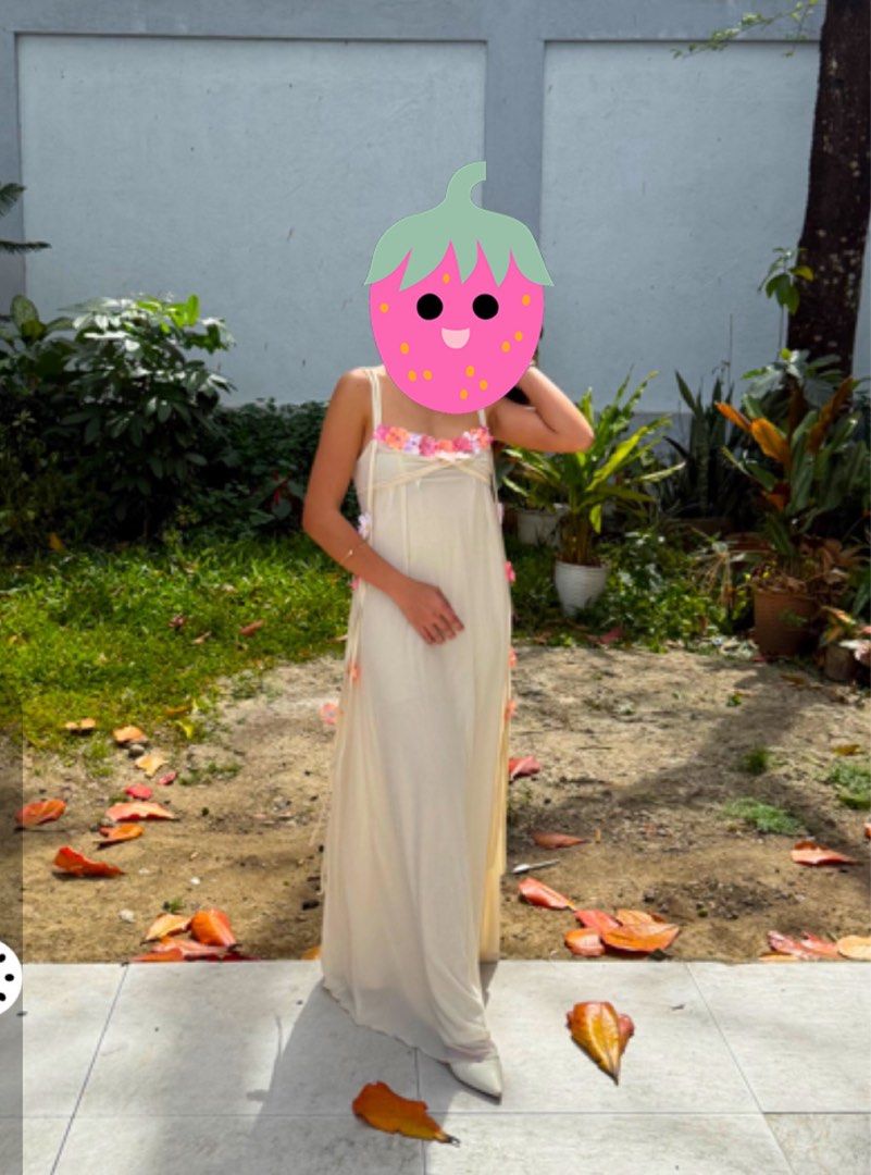 Floral Embellished Maxi Dress (Category: Dresses) located in Cavite. Submitted by gccwardrobe (Listing ID 1438559986, Image 2). Description: - Cream maxi dress - Delicate floral embellishments - Spaghetti straps - Flowing silhouette - Perfect for special occasions - USED ONCE.
