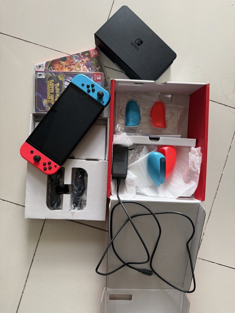 FOR SALE: Nintendo Switch OLED Bundle ₱14,000 (Category: Nintendo) located in Manila. Submitted by johncarlob48437 (Listing ID 1438596844, Image 1). Description: FOR SALE: Nintendo Switch OLED Bundle ₱14,000 Letting go of my Nintendo Switch OLED since I rarely use it anymore. Unit is still in super good condition, very well maintained, lightly used, and works perfectly with zero issues. No scratches, no defects, not jailbroken, and never opened o