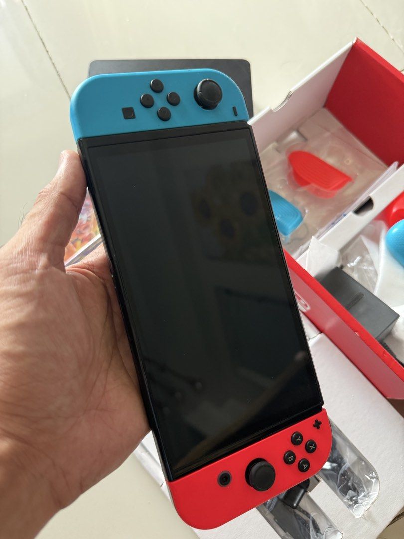FOR SALE: Nintendo Switch OLED Bundle ₱14,000 (Category: Nintendo) located in Manila. Submitted by johncarlob48437 (Listing ID 1438596844, Image 3). Description: FOR SALE: Nintendo Switch OLED Bundle ₱14,000 Letting go of my Nintendo Switch OLED since I rarely use it anymore. Unit is still in super good condition, very well maintained, lightly used, and works perfectly with zero issues. No scratches, no defects, not jailbroken, and never opened o