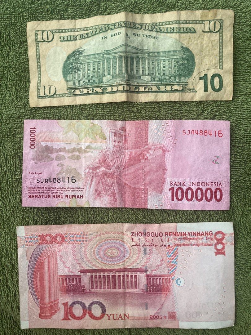 Foreign notes (Category: Currency) located in Singapore. Submitted by buyboldly (Listing ID 1438544733, Image 2). Description: - 10 USD bill has 2 small tears (scotch taped) -All have creases and been folded -Meet at under block(jurong west)or near pioneer mrt.