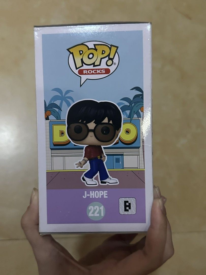 Funko Pop! Rocks BTS J-Hope #221 (Category: Designer & Blind Box Toys) located in Manila. Submitted by docards1102 (Listing ID 1438672066, Image 3). Description: - Funko Pop! Rocks figure of J-Hope from BTS (No. 221). - Brand new, in original packaging. - Depicts J-Hope in his iconic Dynamite era outfit. - Box includes images of other figures in the series..