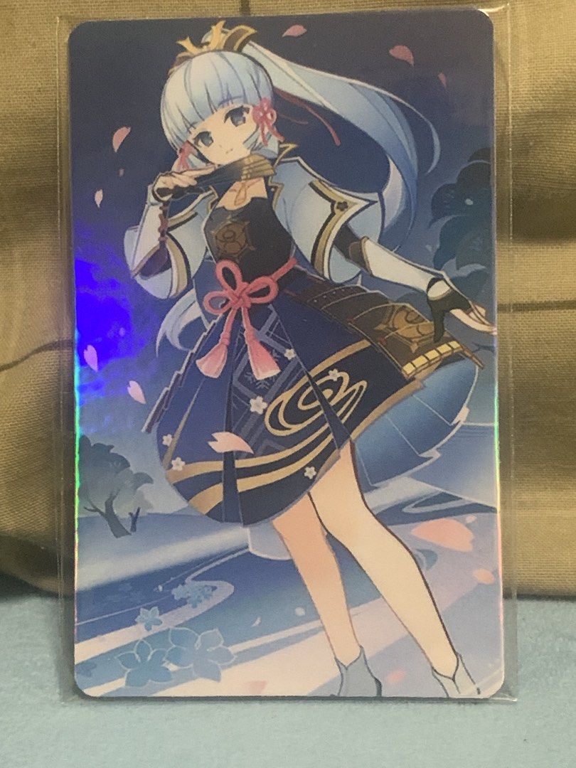 Genshin Impact Ayaka Card (Please see description) (Category: Raw Singles) located in Manila. Submitted by inari05 (Listing ID 1438611875, Image 1). Description: - Genshin Impact Ayaka trading card - Features a detailed Ayaka illustration on the front - Back of card has a blue and white design with Ayaka silhouette -Asking 150 -Sf charged to buyer -First owner -Good condition Rfs:Need space Payment:Gcash.
