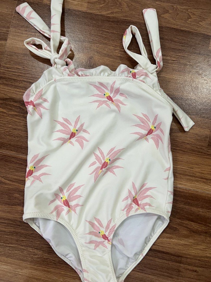 Gingersnaps Floral Swimsuit - 6Y (Category: Babies & Kids Fashion) located in Caloocan City. Submitted by pmaerc (Listing ID 1438598102, Image 1). Description: - Gingersnaps swimsuit - Size: 6Y - Design: Floral pattern - Features: Tie straps, ruffled neckline - Ideal for: Beach and pool days - Material: Comfortable and durable.