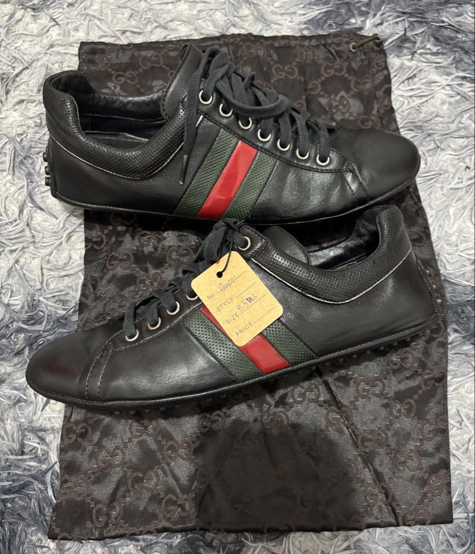Gucci Black Leather Web Low top. (Category: Sneakers & Footwear) located in Legazpi City. Submitted by thesource052 (Listing ID 1438509094, Image 1). Description: Gucci Black Leather Web Low Top Size 8.5Us, 26.5cm 7.5uk No heel drags No major issues Slight scratch only not visible Authentic With og Dustbag.