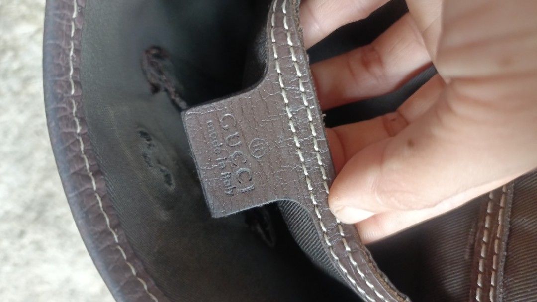 Gucci GG Supreme Messenger Bag (Category: Luxury Bags & Wallets) located in Kidapawan. Submitted by rawvibe-93 (Listing ID 1438569852, Image 2). Description: - Authentic Gucci messenger bag - Iconic GG Supreme canvas - Brown leather strap and trim - Interior tag with Gucci logo and 'Made in Italy' - Serial number: 110943 107750 - Flap closure - Brown shoulder strap.