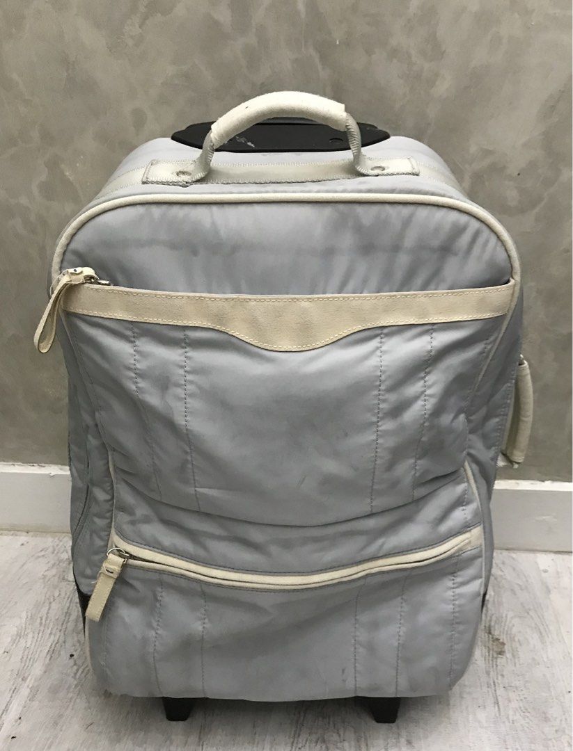 Hand Carry Luggage (Category: Luggage) located in Quezon City. Submitted by 79moving (Listing ID 1438514863, Image 1). Description: Light gray 2 wheeler Issue: zipper handle(last picture) Used..