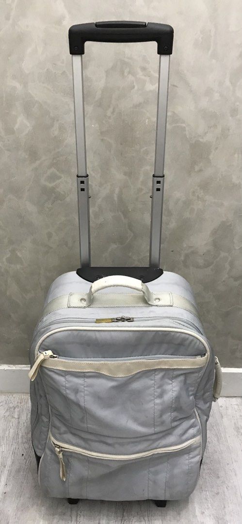 Hand Carry Luggage (Category: Luggage) located in Quezon City. Submitted by 79moving (Listing ID 1438514863, Image 2). Description: Light gray 2 wheeler Issue: zipper handle(last picture) Used..