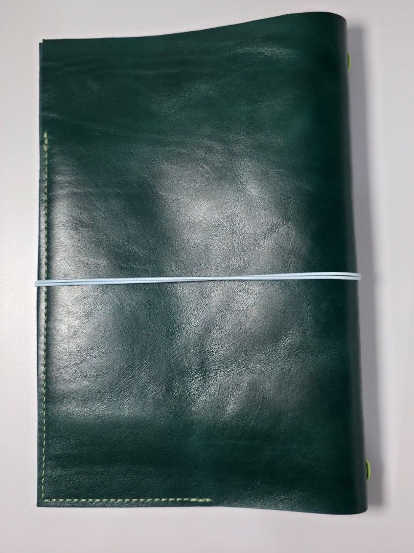 A4 Handmade Leather Journal (Category: Stationery & School Supplies) located in Pasig City. Submitted by ajsssss (Listing ID 1438674566, Image 3). Description: 🌱 A4 Leather Journal Folio 🌱 🪡 Handmade - saddle stiched 🌸 1 set non-grommet: can fit a total of 2 A4 paper refills 🌸 Main cover is Pull-side Leather, Pockets are Vegetable Tanned Malayan Leather 🔆 Order includes 1 A4 Notebook If you need more photos or have questions, please message