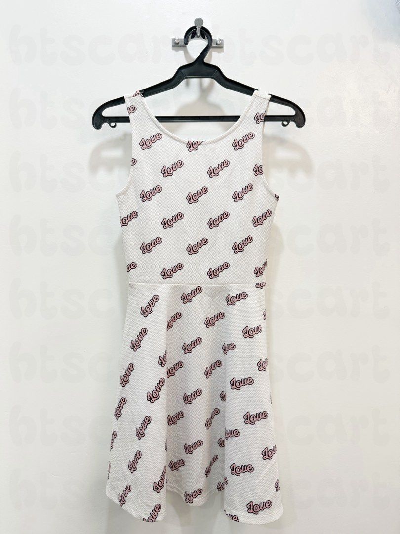 H&M Divided Love Print Dress (Category: Dresses) located in Cainta. Submitted by htscart (Listing ID 1438579682, Image 1). Description: - H&M Divided white dress - 'Love' print - Scoop neck - Cut-out back - Sleeveless - A-line skirt - Size: 32 (EUR 32, US 2).