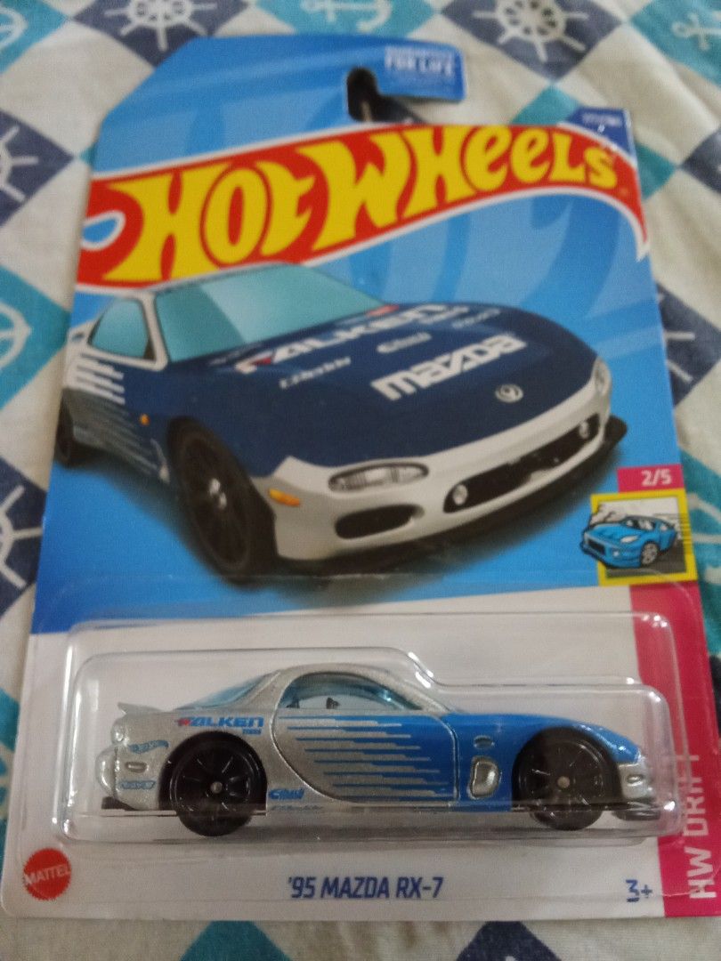 Hot Wheels Falken 95 Mazda RX-7 php250 (Category: Vehicle & Diecast Models) located in Quezon City. Submitted by batangisip (Listing ID 1438526918, Image 1). Description: Hot Wheels Falken 95 Mazda RX-7 php250.