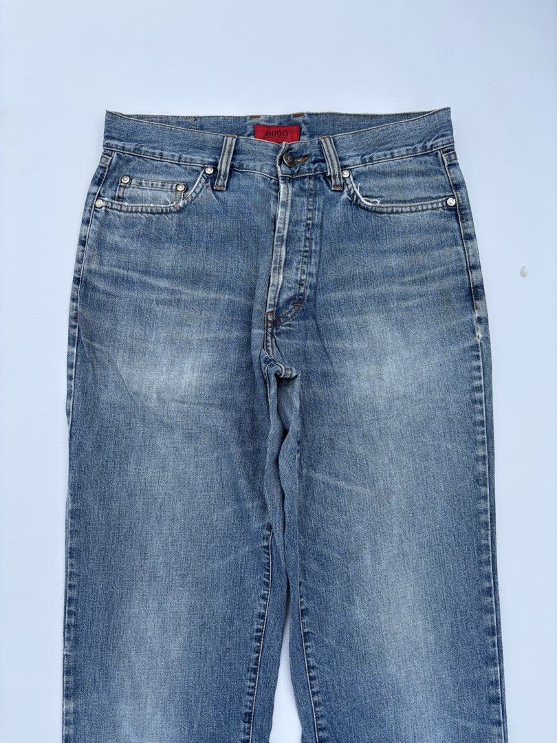 HUGO BOSS STRAIGHT CUR LIGHT WASHED JEANS (Category: Jeans) located in Baguio. Submitted by bl_thrift (Listing ID 1438648371, Image 2). Description: HUGO BOSS STRAIGHT CUR LIGHT WASHED JEANS waist-30 inches length-42 inches leg opening-8 inches thighs-10.5 inches - Authentic Hugo Boss jeans - Light blue wash - Straight leg fit - Size: W31 L34 - Button fly - Classic five-pocket design - Hugo Boss logo on button and back pocket.