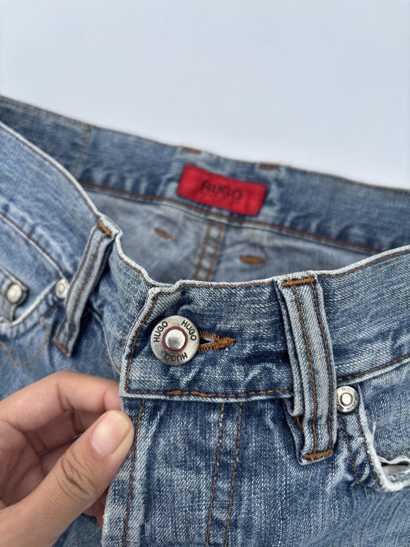HUGO BOSS STRAIGHT CUR LIGHT WASHED JEANS (Category: Jeans) located in Baguio. Submitted by bl_thrift (Listing ID 1438648371, Image 3). Description: HUGO BOSS STRAIGHT CUR LIGHT WASHED JEANS waist-30 inches length-42 inches leg opening-8 inches thighs-10.5 inches - Authentic Hugo Boss jeans - Light blue wash - Straight leg fit - Size: W31 L34 - Button fly - Classic five-pocket design - Hugo Boss logo on button and back pocket.