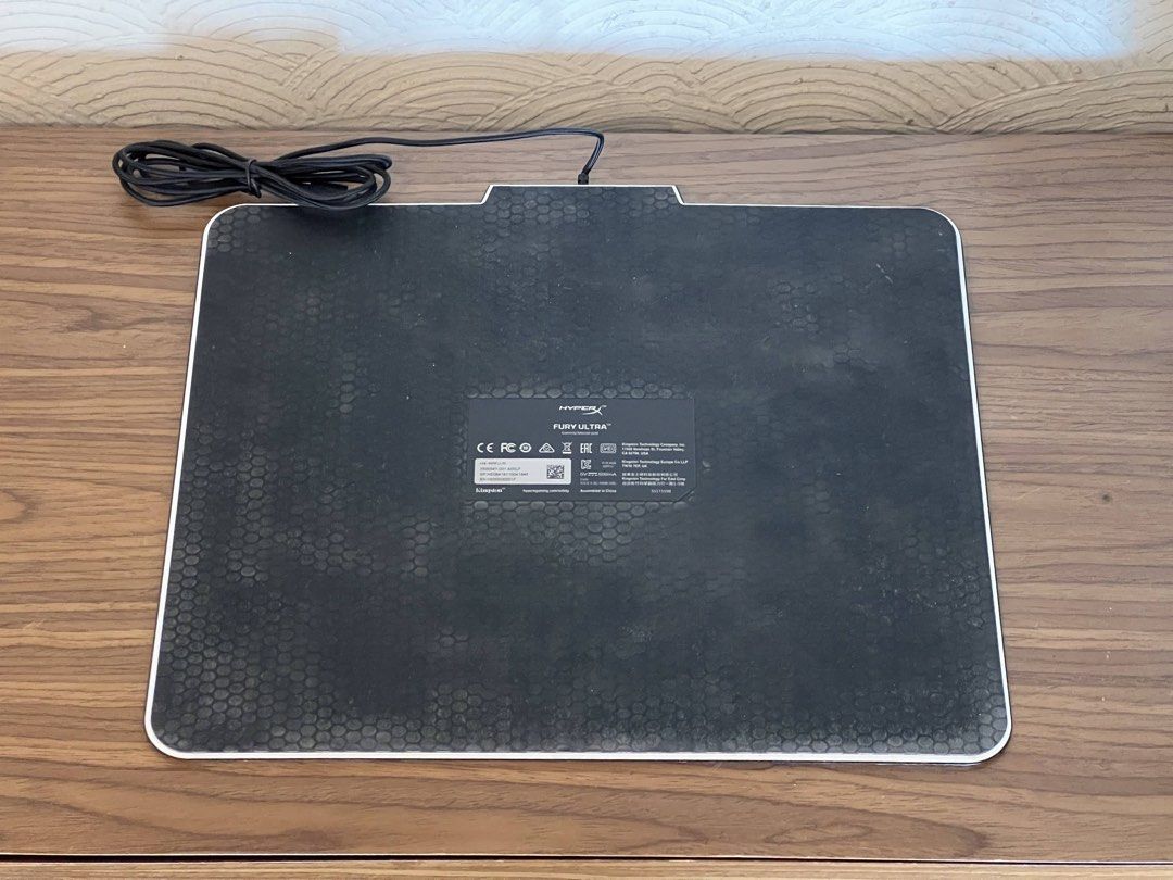 HyperX Fury Ultra RGB Gaming Mousepad (Category: Mouse & Mousepads) located in Pasig City. Submitted by martin.as (Listing ID 1438507126, Image 2). Description: - HyperX Fury Ultra RGB gaming mousepad. - Sleek black surface with HyperX logo. - Textured bottom for enhanced grip. - Wired connection Note: RGB lighting no longer working.