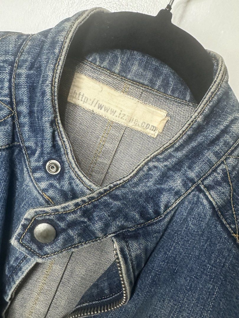 Izzue Denim Jacket (Category: Coats, Jackets and Outerwear) located in Batangas. Submitted by jim2621 (Listing ID 1438510095, Image 3). Description: - Faded denim biker jacket - Stand-up collar - Zip closure - Quilted shoulder detailing - Multiple zip pockets (chest and sides) - Classic biker style - Brand label visible Womens size4.