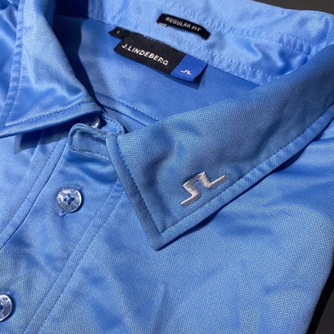 j.lindeberg Regular Fit Polo Shirt (Category: Tshirts & Polo Shirts ) located in Tagum. Submitted by johntams_ (Listing ID 1438547068, Image 2). Description: - J.Lindeberg polo shirt - Light blue color - Regular fit - Classic polo collar - Three-button placket - Sleeve design with blue, white, and red stripes - J.Lindeberg logo detail _CAN FIR MEDIUM TO LARGE (21x28.