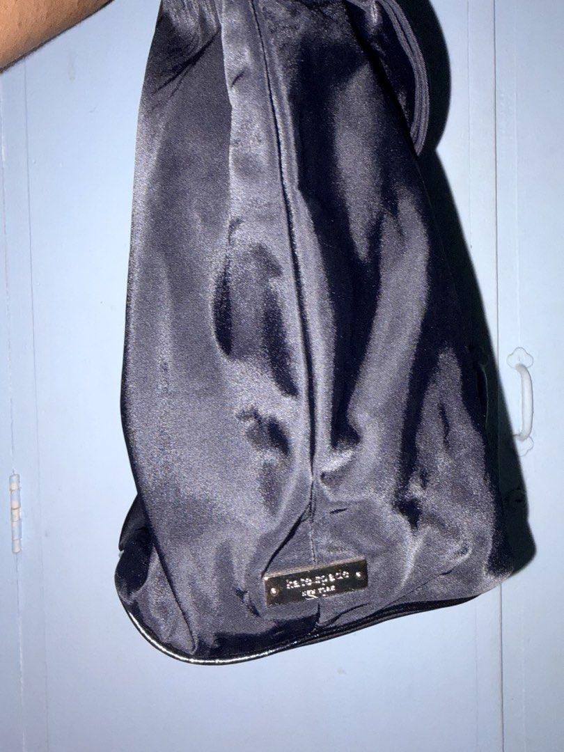 Kate Spade Black Tote Bag (Category: Tote Bags) located in Manila. Submitted by love.hazey (Listing ID 1438637133, Image 2). Description: - Kate Spade black tote bag - Large bow detail on front - Patterned interior lining - Interior zippered pocket - Exterior Kate Spade label - Shoulder strap - Zippered closure.