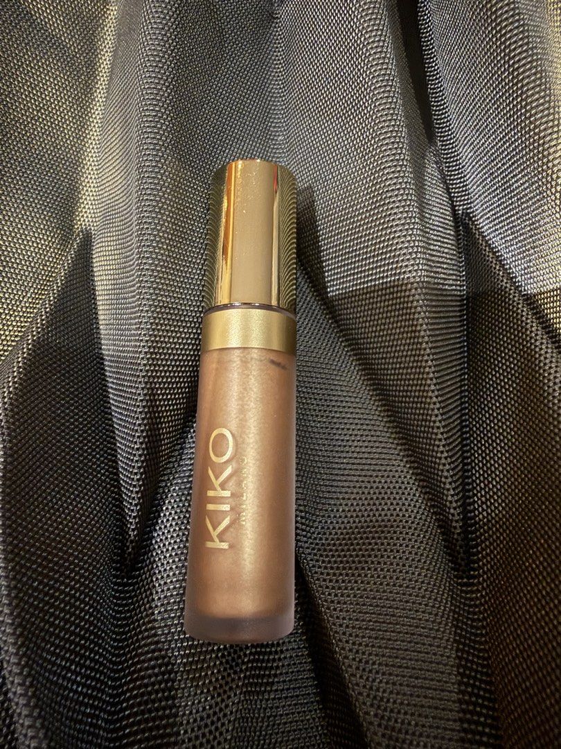 KIKO Joyful Holiday Liquid Highlighter (Category: Makeup) located in Muntinlupa City. Submitted by everythingmustgo_8475da (Listing ID 1438627916, Image 1). Description: - KIKO Joyful Holiday Liquid Highlighter - Bronze liquid highlighter - Features a golden cap - Adds a beautiful glow - KIKO logo visible - shade 03.