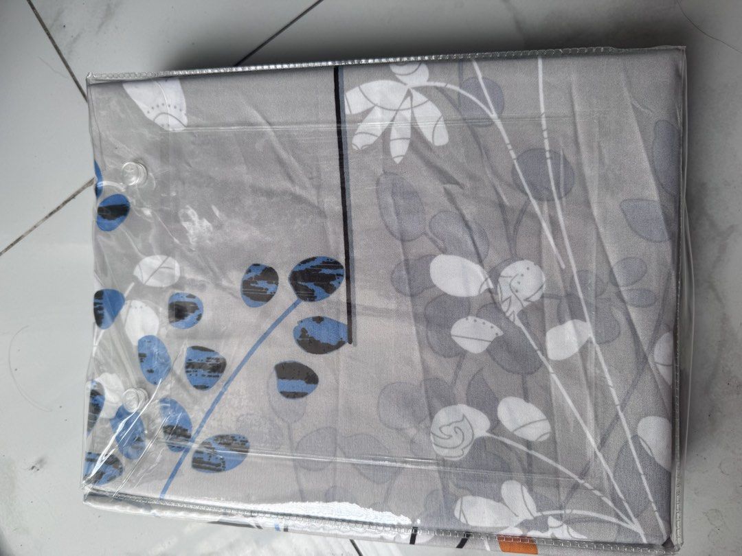 King Size Floral Bed FLAT Sheet (Category: Bedding & Towels) located in Manila. Submitted by decluterthings888 (Listing ID 1438529637, Image 2). Description: - King size bed flat sheet - Floral design - Gray background with white, orange, and blue floral patterns - Brand new - Still in original packaging.