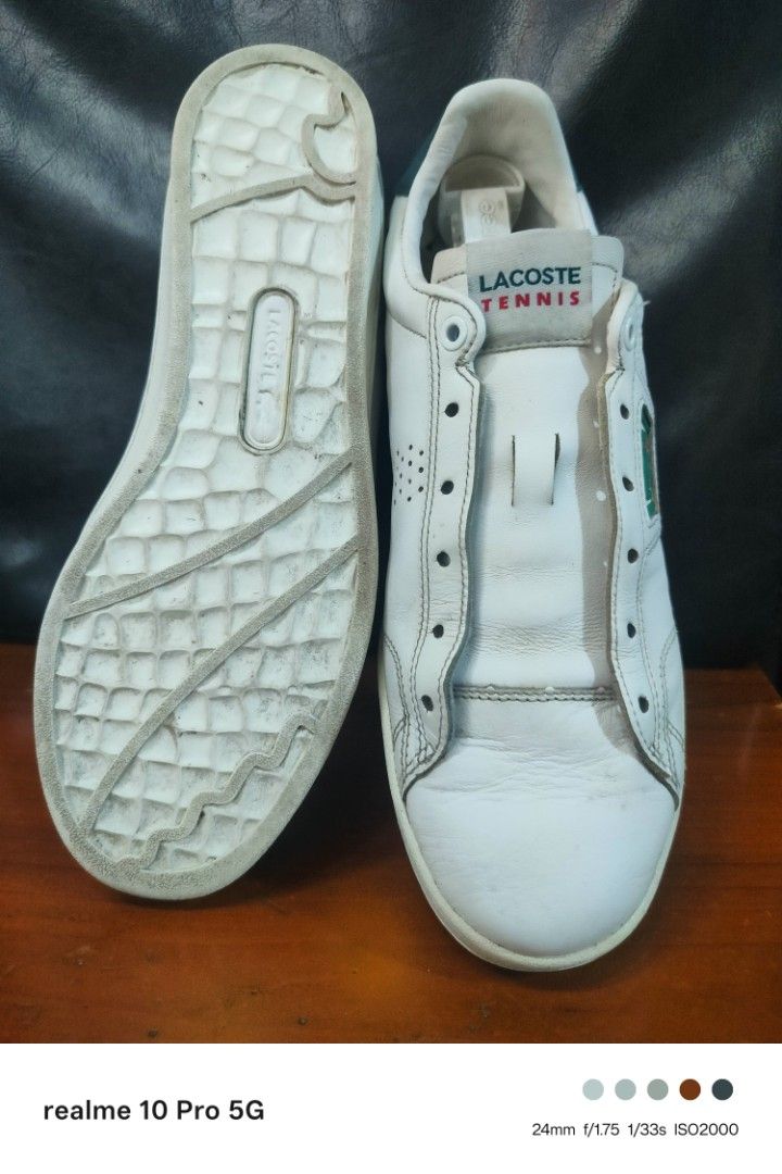 Lacoste Tennis Shoes (Category: Sneakers) located in Manila. Submitted by cleverturtle-2982 (Listing ID 1438620368, Image 2). Description: - White Lacoste Tennis shoes - Features the iconic Lacoste logo - Green accent on the heel - "Lacoste Tennis" branding on the tongue - White sole.