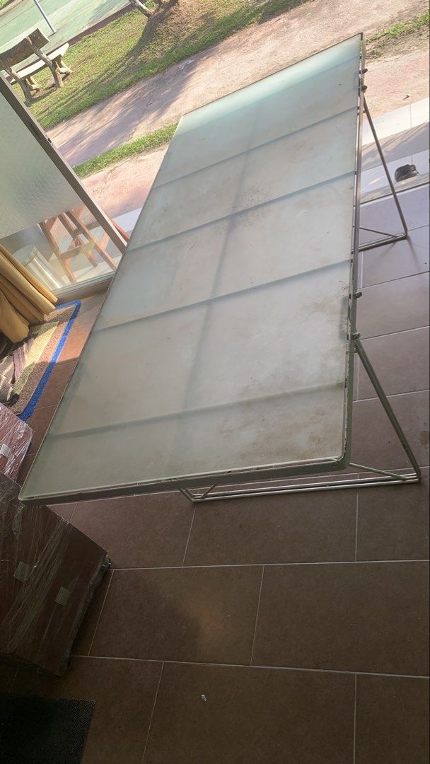 Large Rectangular Table (Category: Tables & Sets) located in Kuala Lumpur. Submitted by onekl (Listing ID 1438663325, Image 1). Description: - Rectangular table - Size : 78.5 inch x 33.5 inch - Height: 27.5 inch - Metal frame - Frosted glass top - Simple design, sturdy base - Versatile use: dining or workspace - Disassembled for easy transport.