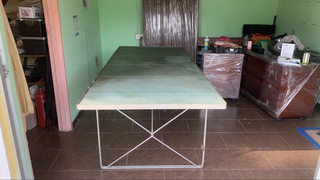 Large Rectangular Table (Category: Tables & Sets) located in Kuala Lumpur. Submitted by onekl (Listing ID 1438663325, Image 2). Description: - Rectangular table - Size : 78.5 inch x 33.5 inch - Height: 27.5 inch - Metal frame - Frosted glass top - Simple design, sturdy base - Versatile use: dining or workspace - Disassembled for easy transport.