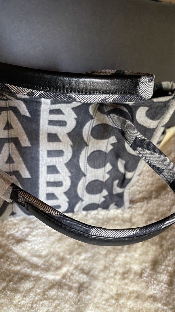 Large Tote (Category: Luxury Bags & Wallets) located in Quezon City. Submitted by smartysmart (Listing ID 1438678560, Image 3). Description: Original bought in US🇺🇸 Extra Large size ideal for traveling almost black but the says it’s blue denim Zipper closure Unique design .