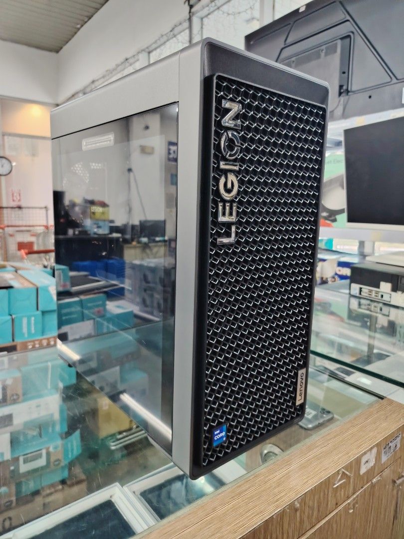 Lenovo Legion Gaming PC (Category: Desktops) located in Manila. Submitted by rollysuela09206 (Listing ID 1438544665, Image 2). Description: - Lenovo Tower Desktop Legion T5 - i7, 14 Generation, 1 TB 32GBDD - Intel Core Processor - Black Case with Mesh Front Panel - Legion Logo on Front - Lenovo Logo on Front - Internal Components Visible - Brand New - Call or Text 09757387803.