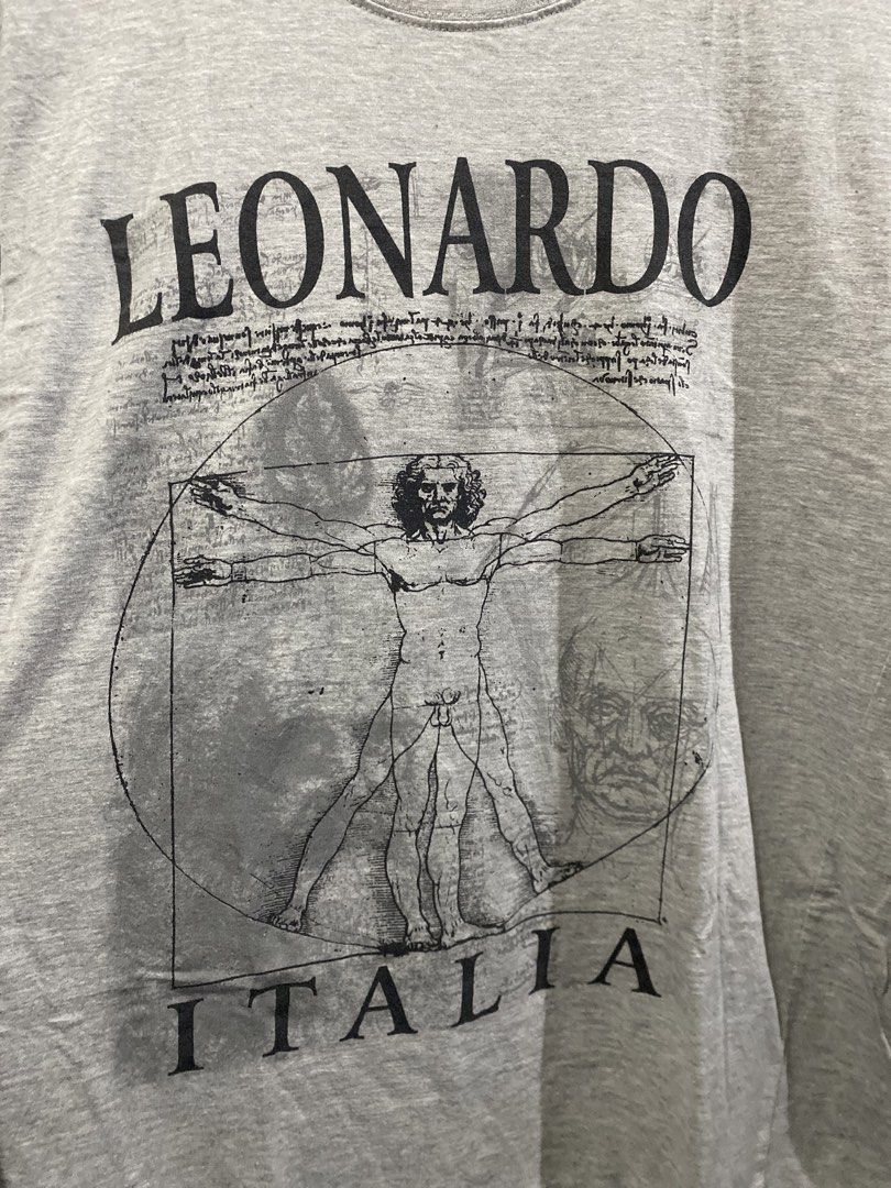 LEONARDO DAVINCI - VITRUVIAN MAN SHIRT (Category: Tshirts & Polo Shirts ) located in Naga. Submitted by junked_garments (Listing ID 1438626429, Image 2). Description: LEONARDO DAVINCI - VITRUVIAN MAN SHIRT CONDITION: VERY GOOD COLOR RATE: 9/10 ISSUE: ALTERED ARM PIT MEASUREMENTS WIDTH: 21” LENGTH: 26” DM ME TO PURCHASE!.