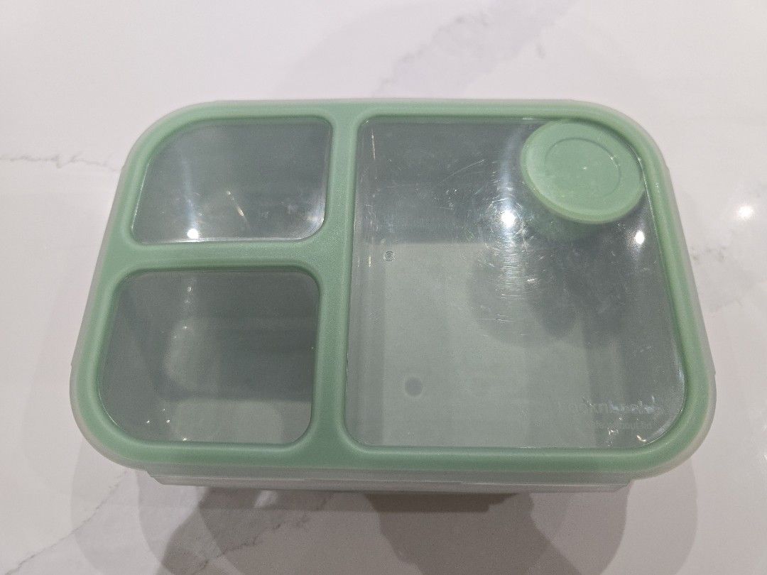 LocknLock Lunch Box with Compartments (Category: Food Organization & Storage) located in Quezon City. Submitted by warm.happylife (Listing ID 1438626159, Image 3). Description: - LocknLock lunch box 1.5L - Multiple compartments for organized meals - Green lid and base with clear top - Includes a small container with lid - Ideal for school or work lunches.