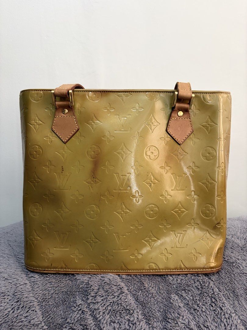 Louis Vuitton Houston Vernis Tote Bag (Category: Luxury Bags & Wallets) located in Tanza. Submitted by iamdhana (Listing ID 1438567539, Image 1). Description: - Louis Vuitton Vernis tote bag - Glossy olive-green exterior - Embossed LV logos - Two top handles with leather accents - Zipper closure Pre-loved Please check the pictures This model is really prone to discoloration, better to do professional restoration or redyeing to increase value:) No