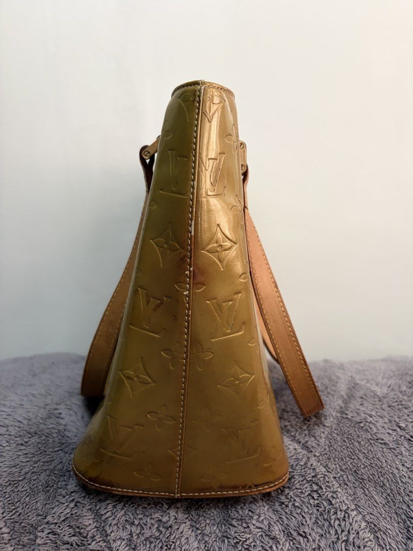 Louis Vuitton Houston Vernis Tote Bag (Category: Luxury Bags & Wallets) located in Tanza. Submitted by iamdhana (Listing ID 1438567539, Image 2). Description: - Louis Vuitton Vernis tote bag - Glossy olive-green exterior - Embossed LV logos - Two top handles with leather accents - Zipper closure Pre-loved Please check the pictures This model is really prone to discoloration, better to do professional restoration or redyeing to increase value:) No