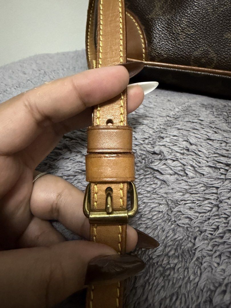 Louis Vuitton Monogram TrocaderoBag (Category: Luxury Bags & Wallets) located in Tanza. Submitted by iamdhana (Listing ID 1438571570, Image 2). Description: DECLUTERRING SALE! Pre-loved Coded Bought in Japan Generally smooth except strap (common issue of Trocadero) and the inside of the inside-zipped compartment (look at the last two pictures) - Monogram shoulder bag - Iconic monogram canvas - Adjustable long strap - Top zipper closure - Front po