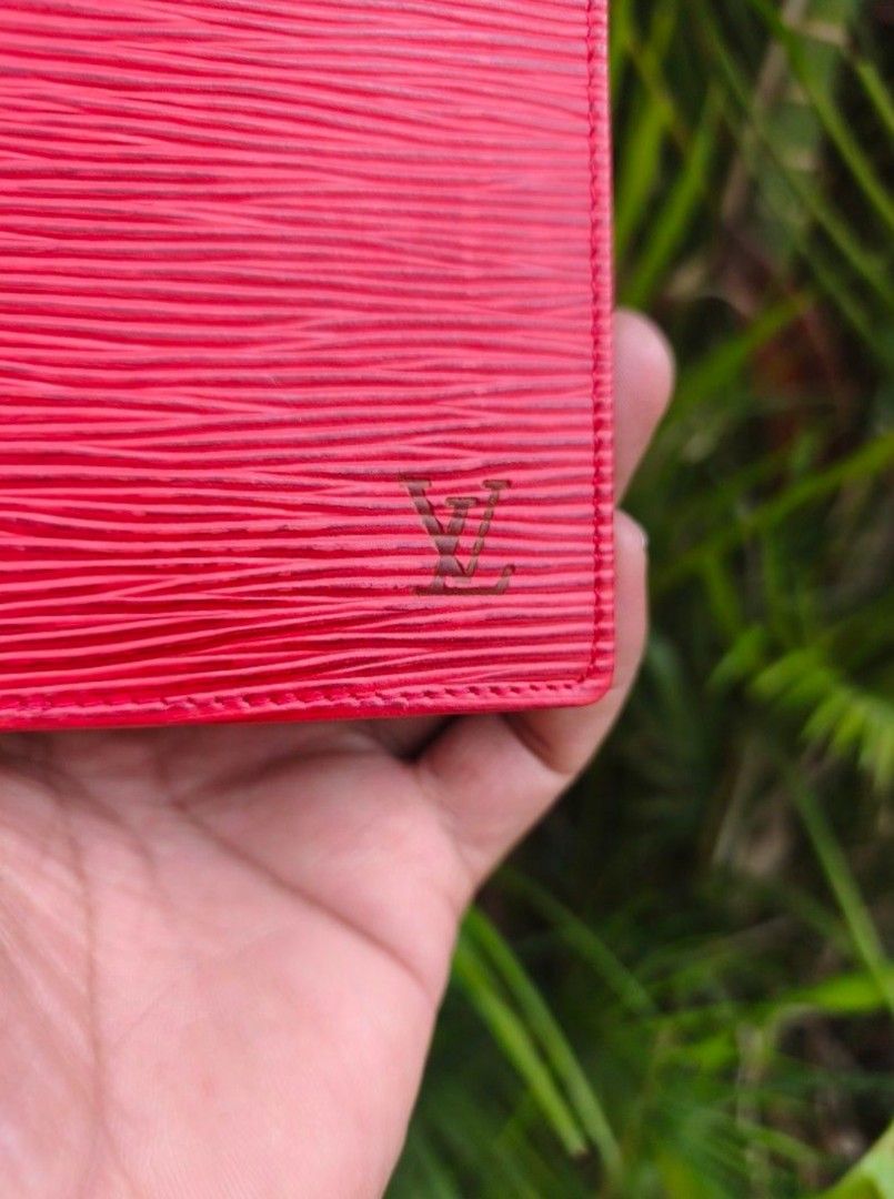Louis Vuitton Red Epi Leather Wallet (Category: Luxury Bags & Wallets) located in Quezon City. Submitted by bybelaching (Listing ID 1438686619, Image 2). Description: Authentic Louis Vuitton wallet Red Epi leather Multiple card slots Bill compartment Red interior Made in France Iconic LV logo Stylish and functional FRESH FROM JAPAN SOURCE EXCELLENT CONDITION SIGN OF USAGE 1250 + SF DKO MAKITA CODE PERO NUNG PINOST KO, AUTOMATIC SA DESCRIPTION AUT