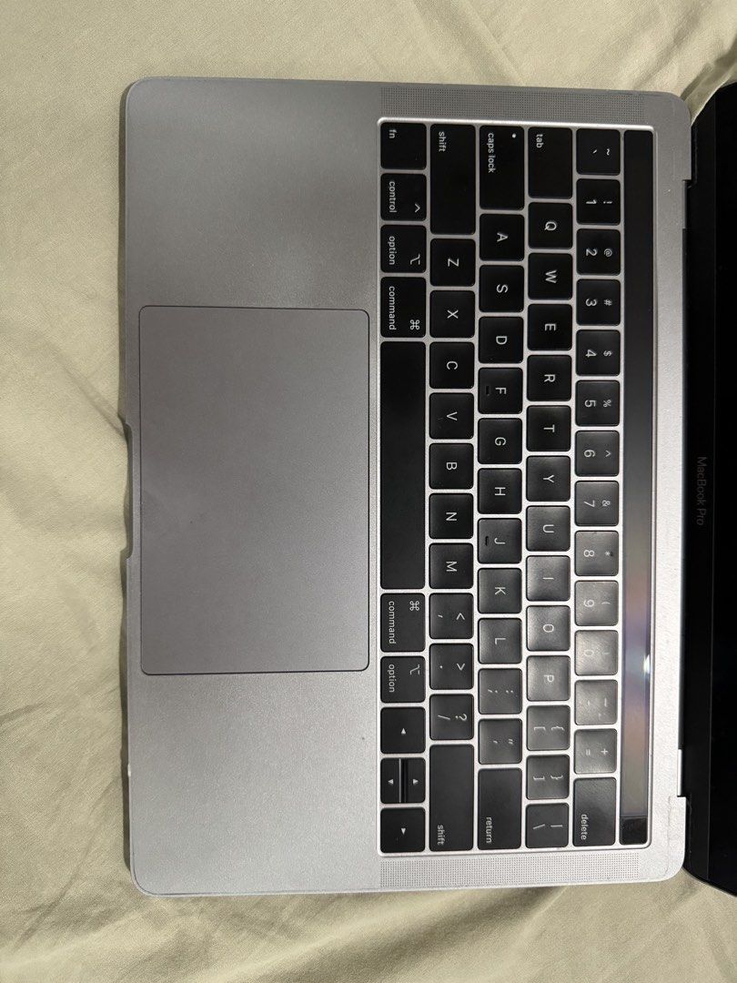 MacBook Pro 13-inch 2019 (Category: Laptops & Notebooks) located in Manila. Submitted by usuajsheole213311 (Listing ID 1438632765, Image 2). Description: - MacBook Pro 13-inch (Silver) - 1.4 GHz Quad-Core Intel Core i5 processor - 8GB 2133 MHz LPDDR3 memory - Intel Iris Plus Graphics 645 (1536 MB) - macOS Sequoia 15.7.5 - Two Thunderbolt 3 ports minor scratch.