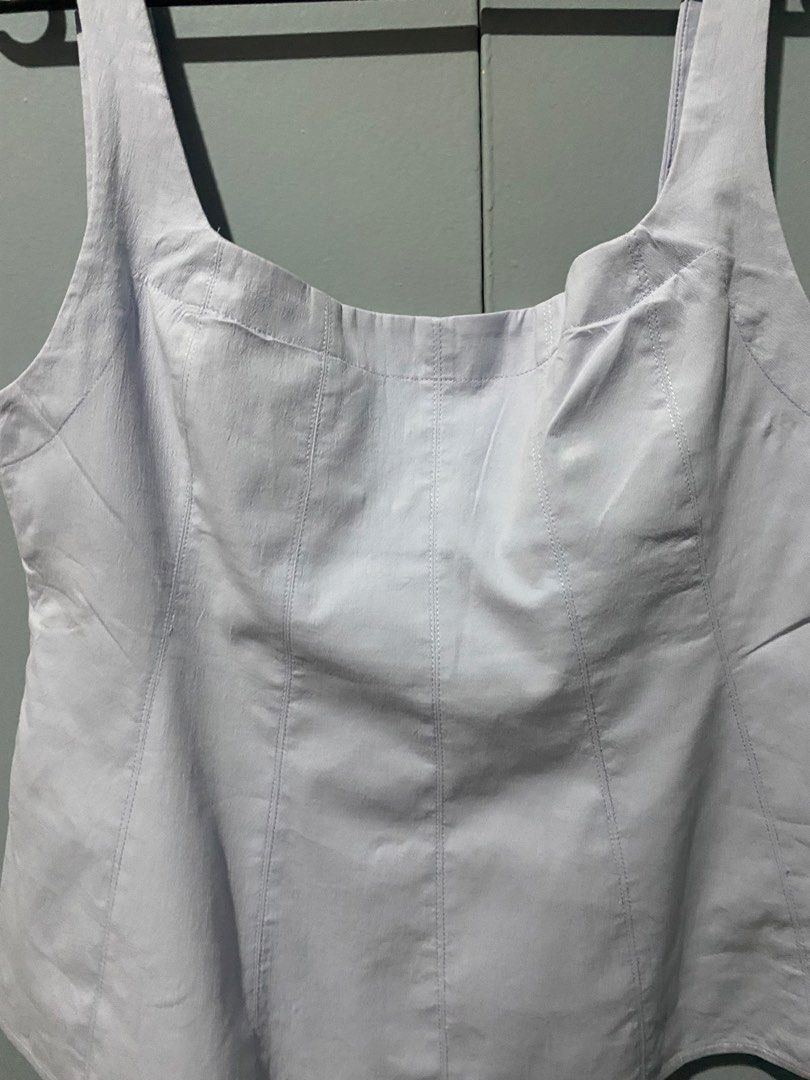 Mango Square Neck Tank Top (Category: Sleeveless) located in Mandaluyong City. Submitted by _adjh (Listing ID 1438682153, Image 2). Description: - Mango light blue tank top - Square neckline - Fitted bodice with flared waist - Side zipper closure - Size: Large - Brand new, never worn, just laundered.